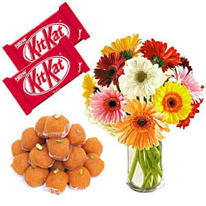 12 Gerberas with Chocolates and Sweets